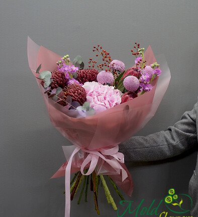 Bouquet of pink hydrangea, protea, and chrysanthemums photo 394x433
