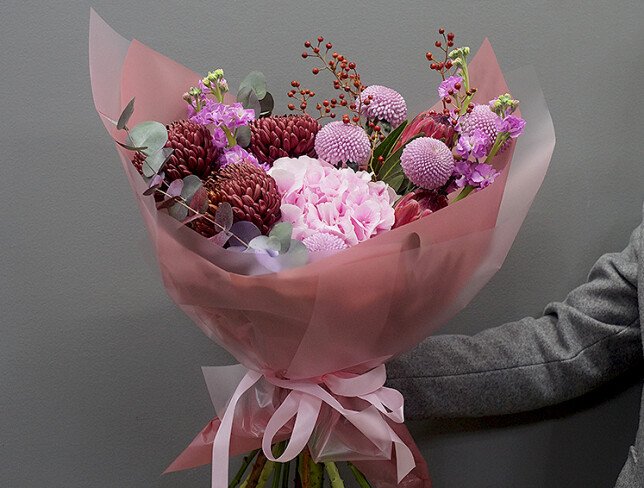 Bouquet of pink hydrangea, protea, and chrysanthemums photo