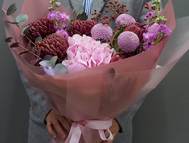 Bouquet of pink hydrangea, protea, and chrysanthemums photo