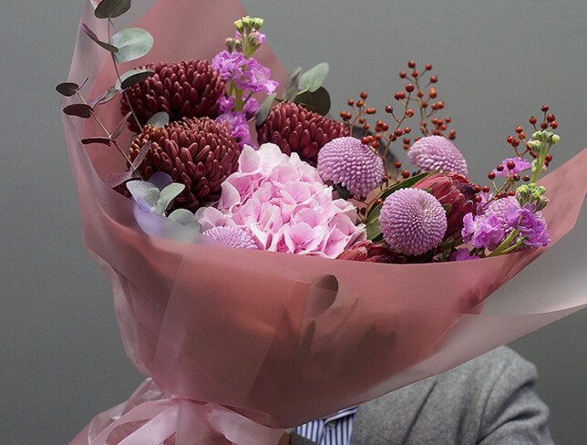 Bouquet of pink hydrangea, protea, and chrysanthemums photo