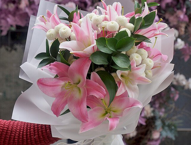 Bouquet of pink lilies and white chrysanthemums photo