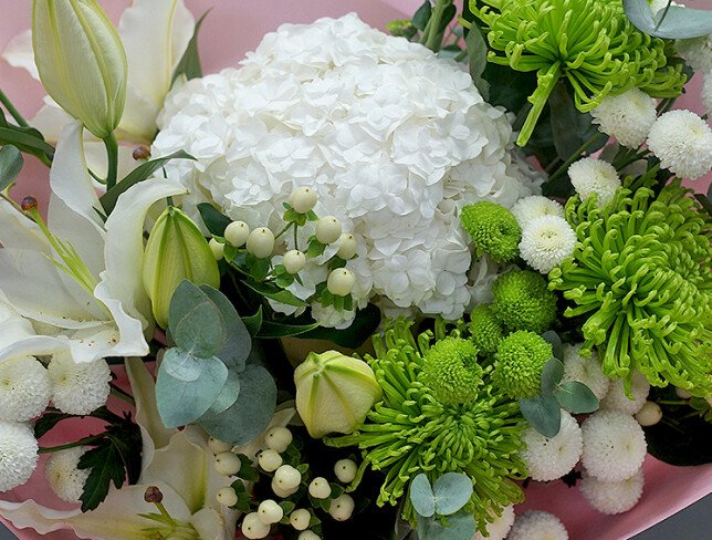 Bouquet of white lilies, hydrangeas, and chrysanthemums photo