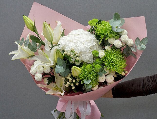 Bouquet of white lilies, hydrangeas, and chrysanthemums photo