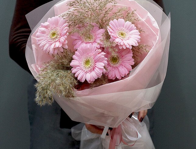 Bouquet of pink gerberas and dried flowers photo