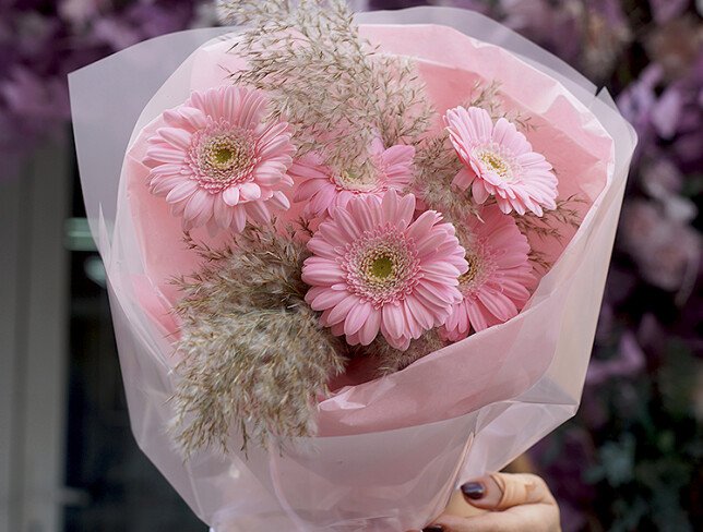 Bouquet of pink gerberas and dried flowers photo