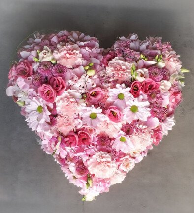 Funeral arrangement of pink chrysanthemums, eustoma, and carnations (d=30) photo 394x433