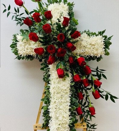 Funeral arrangement with white chrysanthemums and red roses photo 394x433