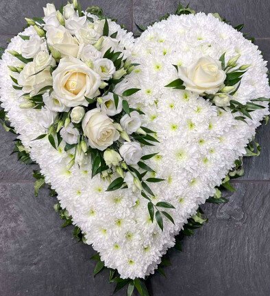 Funeral arrangement of white roses, chrysanthemums, and eustoma (d=30) photo 394x433