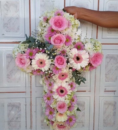 Funeral arrangement of pink rose, hydrangea, and chrysanthemums photo 394x433