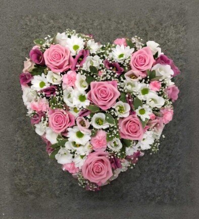 Funeral arrangement of roses, carnations, and eustoma (d=30) photo 394x433