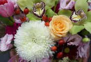 Woven basket with eustoma, green orchids and white spherical chrysanthemum — photo 3