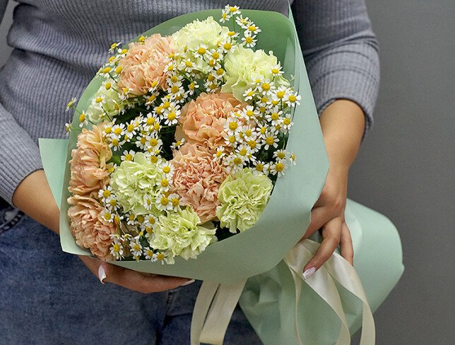 Bouquet of multicolored dianthus and daisies photo