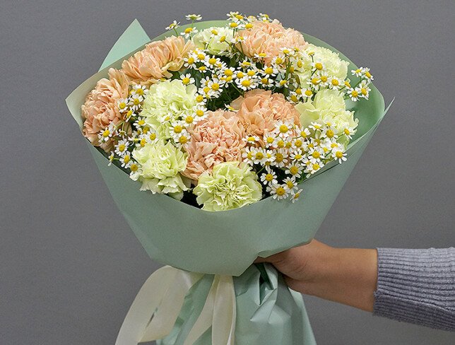 Bouquet of multicolored dianthus and daisies photo