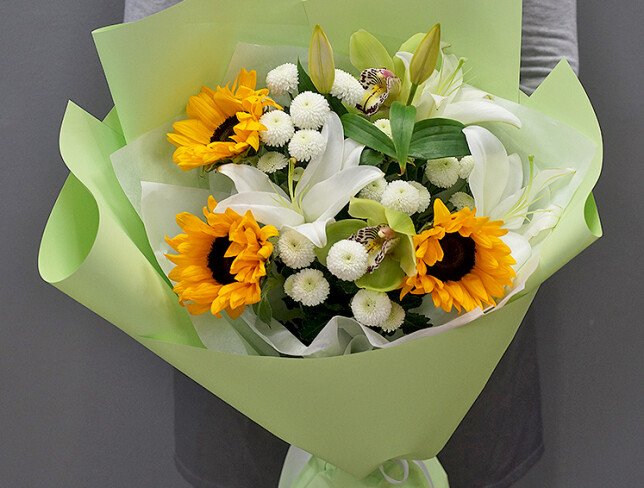 Bouquet with sunflowers, white lilies and chrysanthemums photo