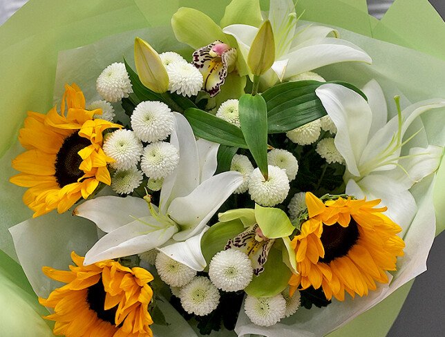 Bouquet with sunflowers, white lilies and chrysanthemums photo
