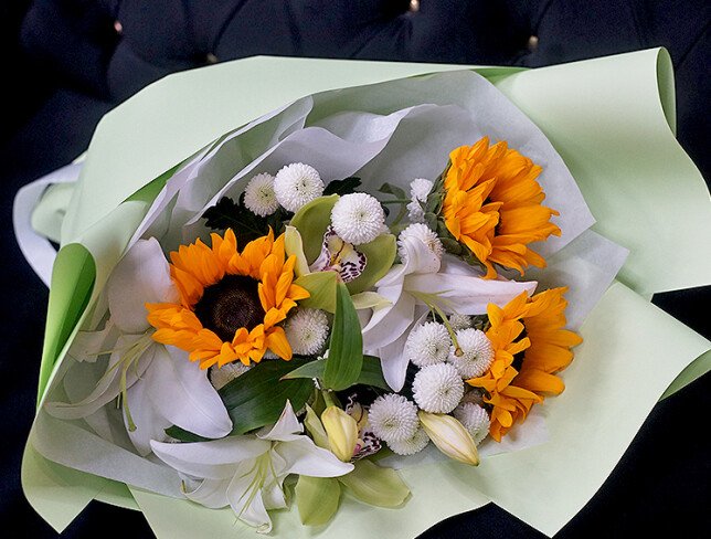 Bouquet with sunflowers, white lilies and chrysanthemums photo