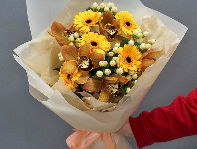 Bouquet of gerberas, orchids and hypericum photo