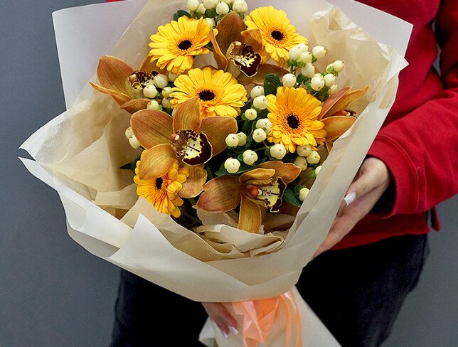 Bouquet of gerberas, orchids and hypericum photo