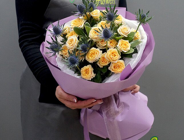 bouquet with cream bush roses and eryngium photo