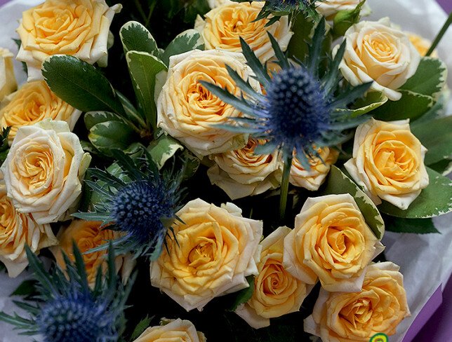 bouquet with cream bush roses and eryngium photo