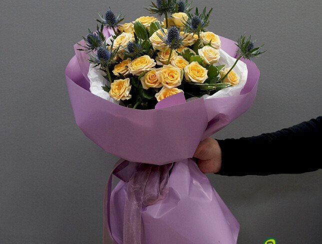 bouquet with cream bush roses and eryngium photo