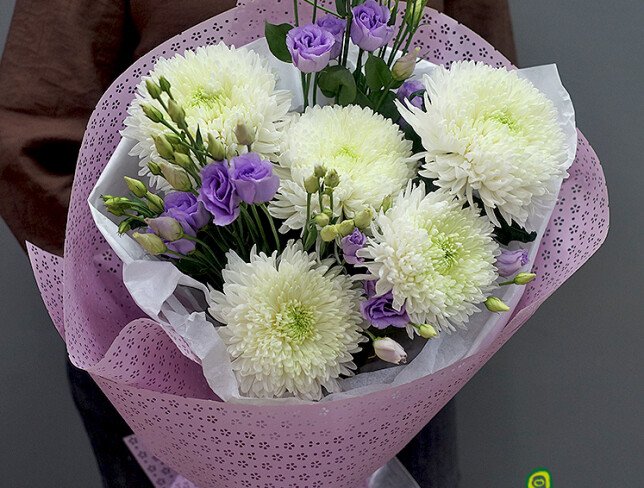 Bouquet of white pompon chrysanthemums and purple lisianthus photo