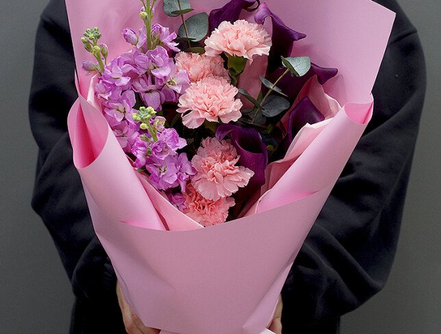 Bouquet with purple calla lilies, pink dianthus and matthiola photo
