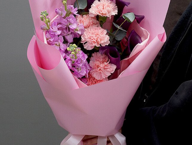 Bouquet with purple calla lilies, pink dianthus and matthiola photo