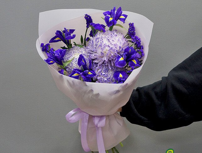 Bouquet of chrysanthemums, iris and statice photo