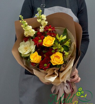 Bouquet of yellow roses, burgundy chrysanthemums and brassica