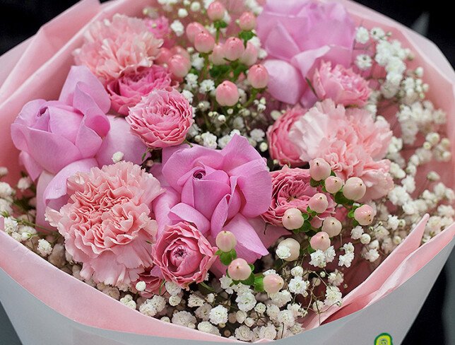 Bouquet with roses, carnations and pink hypericum photo