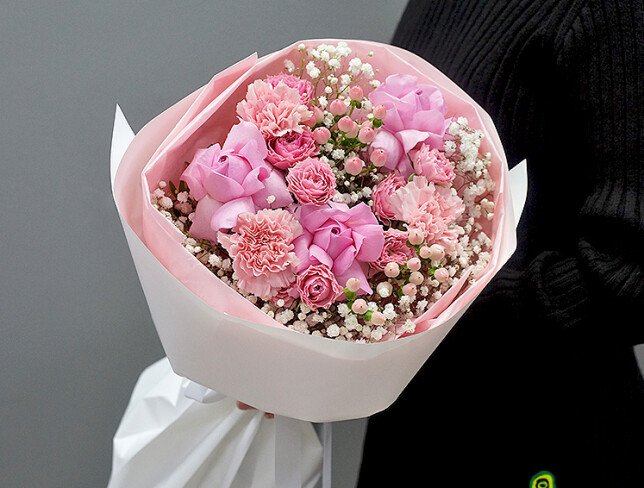 Bouquet with roses, carnations and pink hypericum photo