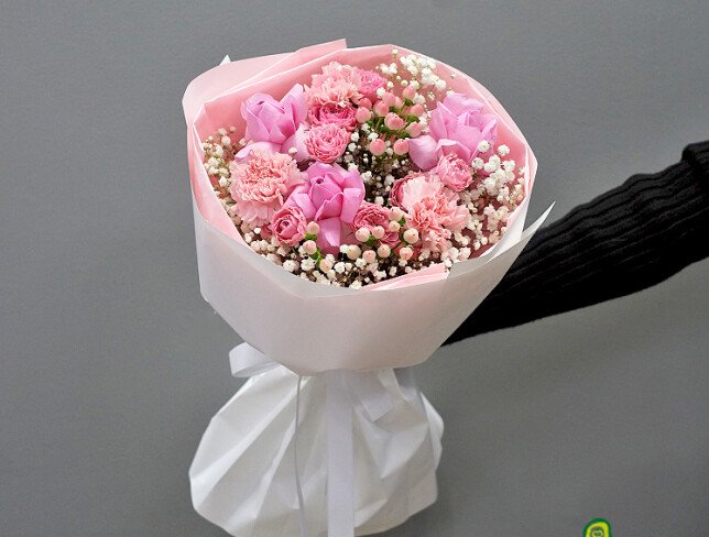 Bouquet with roses, carnations and pink hypericum photo