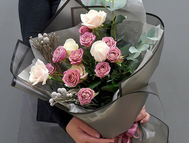 Bouquet of roses, eucalyptus and brunia photo