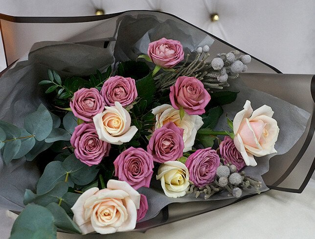 Bouquet of roses, eucalyptus and brunia photo