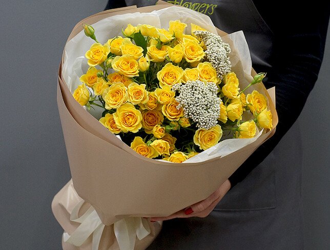 Bouquet with yellow spray roses and ozothamnus photo