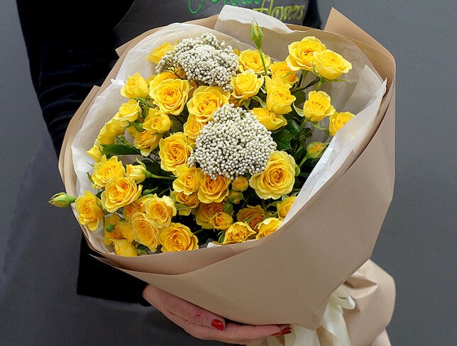 Bouquet with yellow spray roses and ozothamnus photo