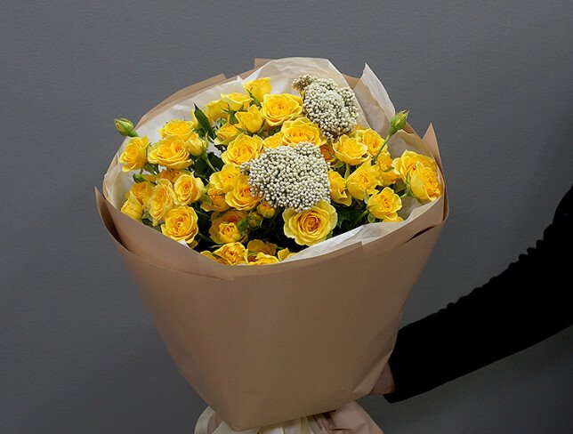 Bouquet with yellow spray roses and ozothamnus photo