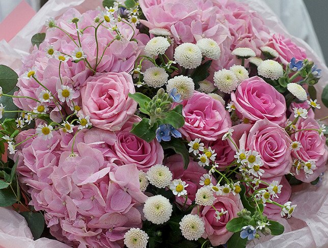 Bouquet of pink hydrangeas, roses, white chrysanthemums and daisies photo