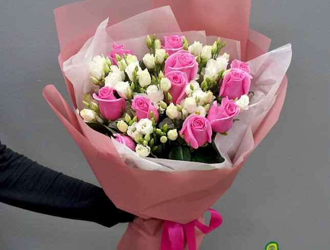 Bouquet of pink roses and white eustoma photo
