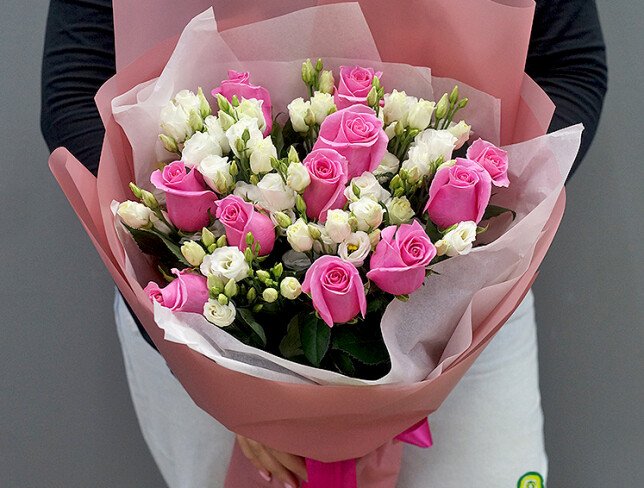 Bouquet of pink roses and white eustoma photo