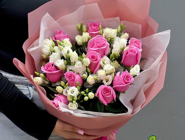 Bouquet of pink roses and white eustoma photo