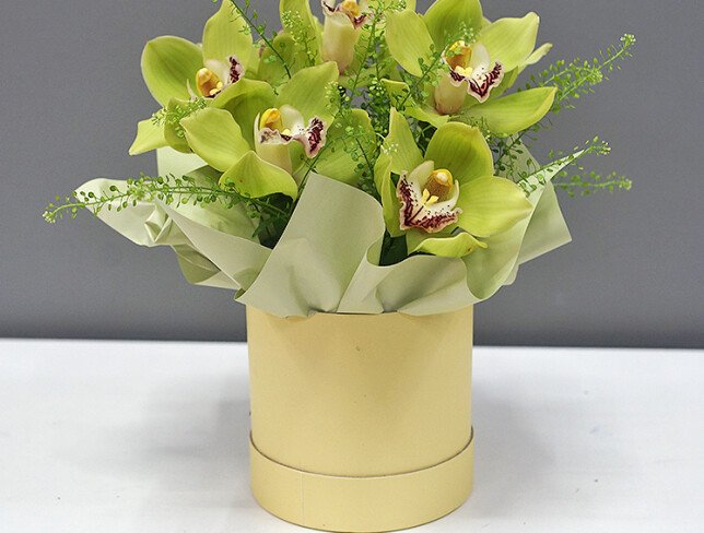 Box with green orchids photo
