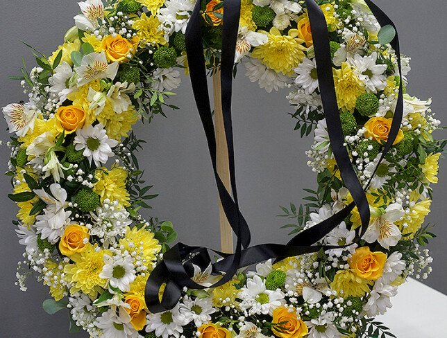 Funeral wreath of yellow roses, chrysanthemums, and alstroemeria (d=55) photo