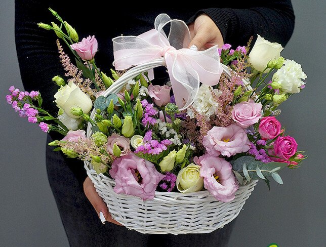 Basket of roses and eustoma photo