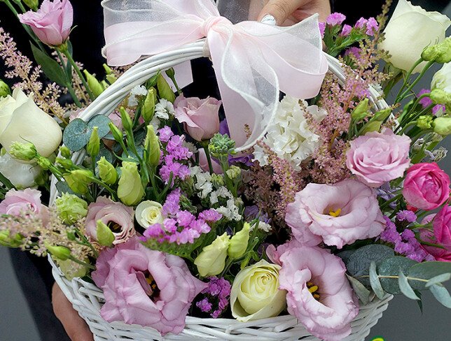 Basket of roses and eustoma photo