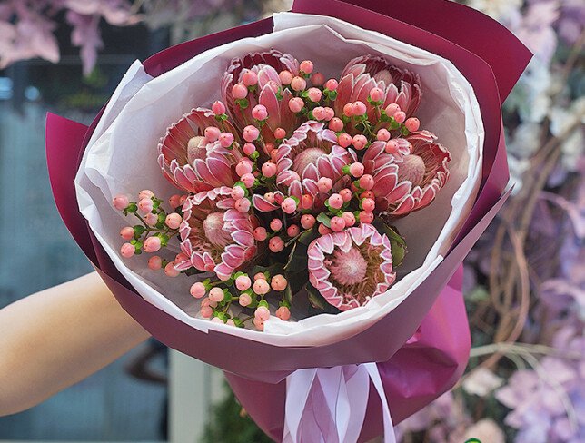 Exotic Bouquet with Protea and Pink Hypericum photo