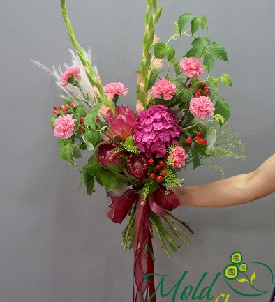 Bouquet with pink hydrangea, protea, gladiolus, and pink dianthus photo 394x433